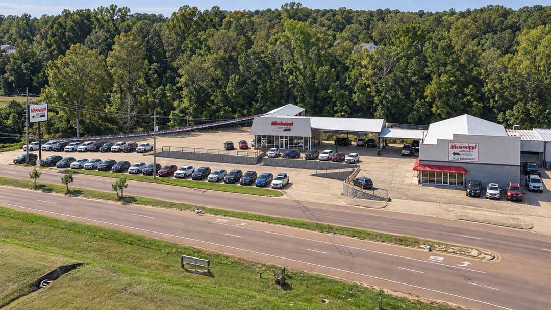 Aerial view of Mississippi Auto Direct property and inventory