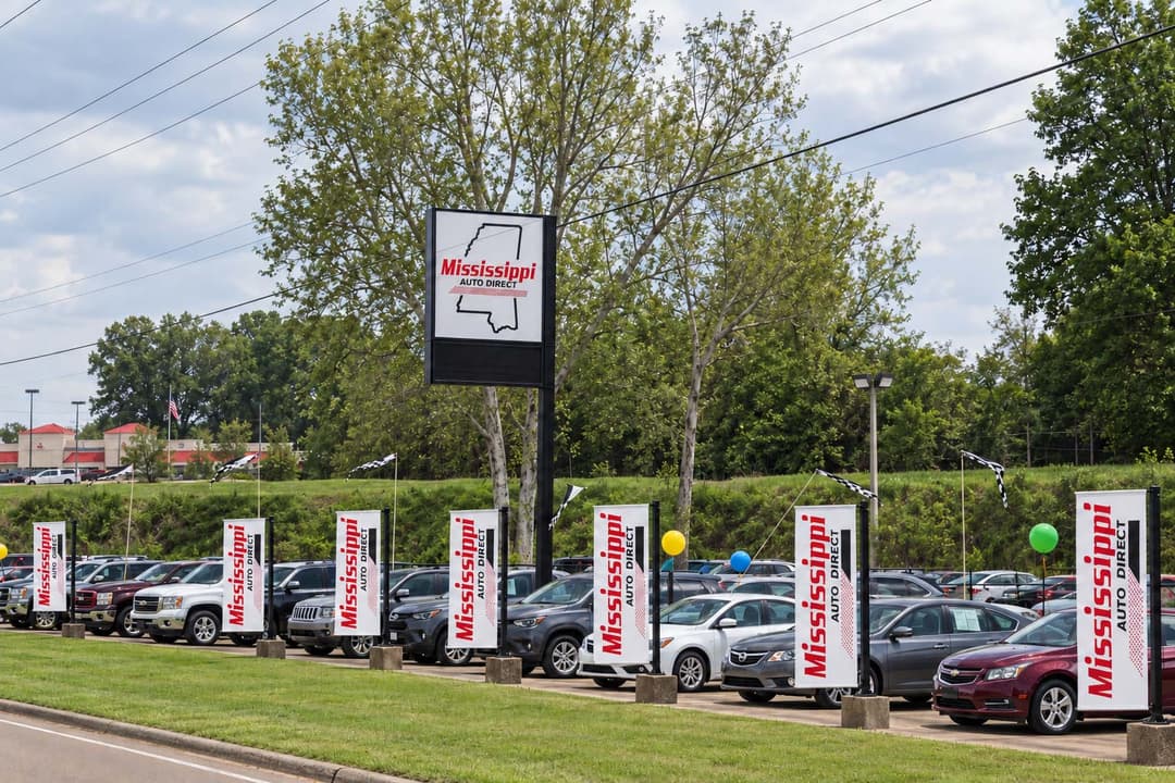 Roadside inventory and Mississippi Auto Direct sign